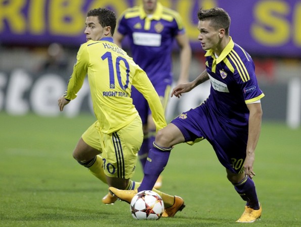 Chelsea playmaker Eden Hazard and Maribor defender Petar Stojanovic battle for possession in their Champions League game Eden Hazard Chelsea Petar Stojanovic Maribor