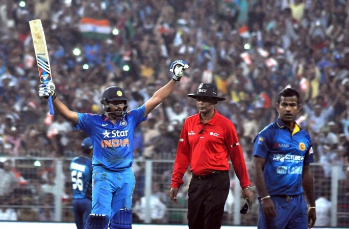 Rohit Sharma celebrates after completing his double century Rohit Sharma India S Ravi Sri Lanka Nuwan Kulasekara