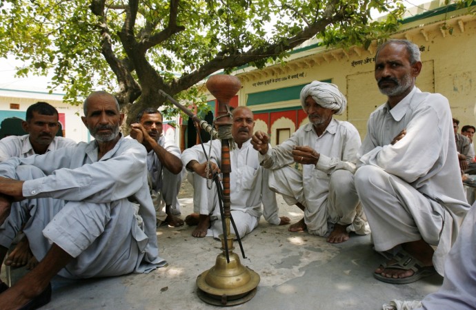 woman paraded naked india / panchayat