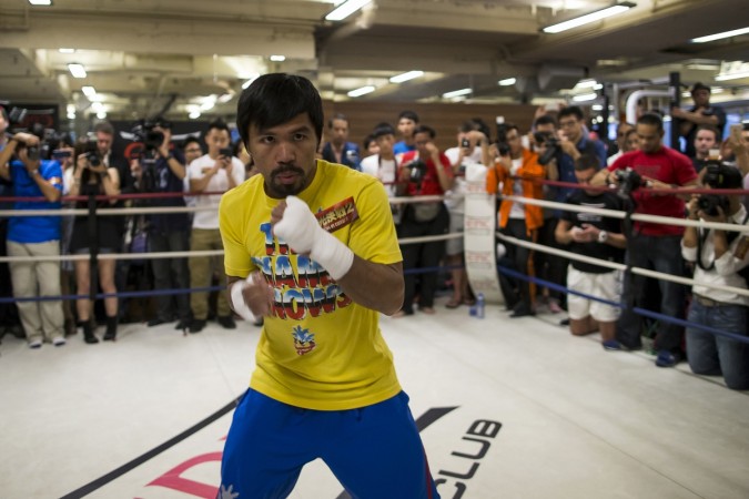 Boxer Manny Pacquiao of the Philippines trains during a media workout in Hong Kong. Manny Pacquiao