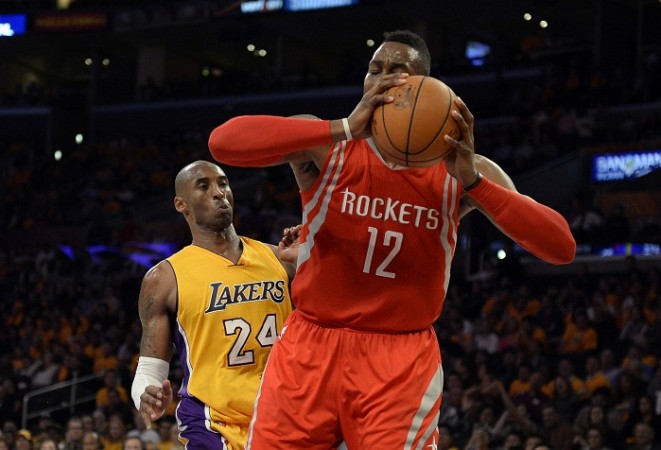 Kobe Bryant and Dwight Howard in action during their NBA game earlier this season Kobe Bryant Dwight Howard Houston Rockets LA Lakers