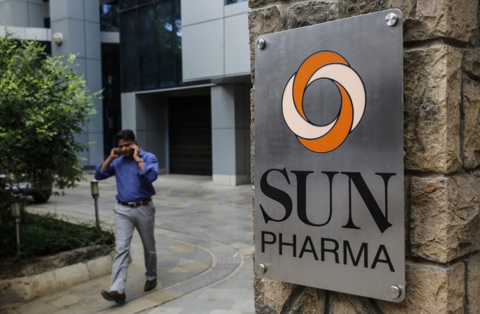 An employee speaks on the phone as he walks out of the research and development centre of Sun Pharmaceutical Industries Ltd in Mumbai. Sun Pharma