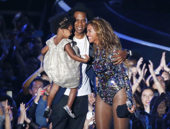 Beyonce smiles with Jay-Z and daughter Blue Ivy after accepting the Video Vanguard Award on stage during the 2014 MTV Video Music Awards in Inglewood, California August 24, 2014 Beyoncé Pregnant with Second Child?