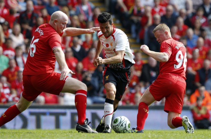 Garcia (centre) claims that there are no shortage of Liverpool fans in India Luis Garcia