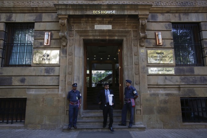 A man walks out of the office of Tata Consultancy Services (TCS) in Mumbai, India Tata Consultancy Services
