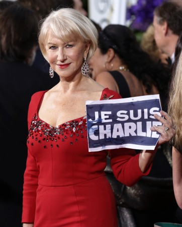 Actress Helen Mirren holds a "Je Suis Charlie" sign