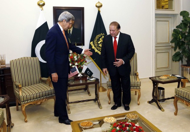 U.S. Secretary of State John Kerry (L) gestures to Pakistan Prime Minister Nawaz Sharif shortly after arriving in Islamabad, Pakistan January 12, 2015 U.S. Secretary of State John Kerry (L) gestures to Pakistan Prime Minister Nawaz Sharif shortly after arriving in Islamabad, Pakistan January 12, 2015