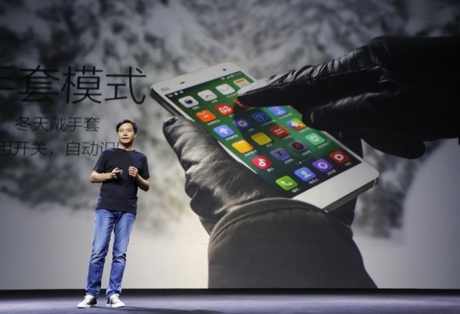 Lei Jun, founder and chief executive officer of China's mobile company Xiaomi Inc, introduces the new features of Xiaomi Phone MI 4 Lei Jun, founder and chief executive officer of China's mobile company Xiaomi Inc, introduces the new features of Xiaomi Phone MI 4