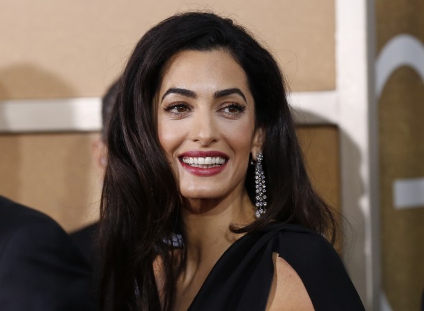 Amal Clooney appeals to Egyptian president to let Al Jazeera journalist Mohamed Fahmy walk free. Amal Clooney