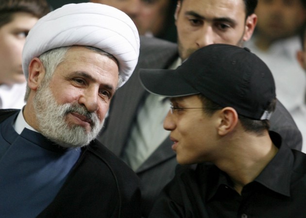 Jihad Moughniyah (R), son of Lebanon's Hezbollah late military leader Imad Moughniyah, sits beside Hizbollah Deputy Secretary General Naeem Kassem during a ceremony marking his fathers 40th death in Beirut's suburbs in this March 24, 2008 file photo. Jihad Moughniyah (R), son of Lebanon's Hezbollah late military leader Imad Moughniyah, sits beside Hizbollah Deputy Secretary General Naeem Kassem during a ceremony marking his fathers 40th death in Beirut's suburbs in this March 24, 2008 file photo.