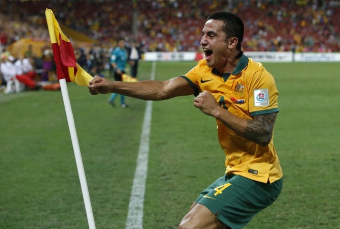 Australia striker Tim Cahill celebrates after scoring against China in the quarterfinals of the AFC Asian Cup Tim Cahill Australia