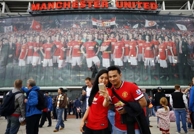 Manchester United season-ticket holders face a one-game ban if they do not buy tickets for the Red Devils' FA Cup replay fixture against Cambridge United on 4 February Manchester United