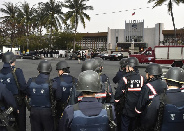 Police officers stand guard outside Kaohsiung Prison, southern Taiwan, February 11, 2015. Police officers stand guard outside Kaohsiung Prison, southern Taiwan, February 11, 2015.