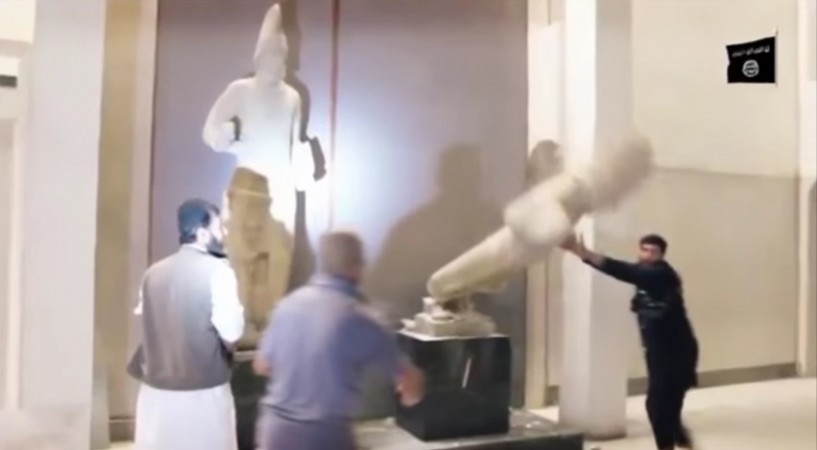 A new Isis video published on Thursday showed jihadists attacking and destroying centuries old Iraqi artifacts. A new Isis video published on Thursday showed jihadists attacking and destroying centuries old Iraqi artifacts.