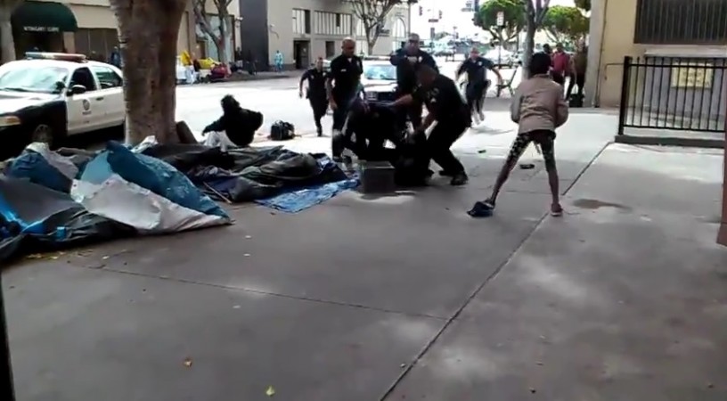 Police in Los Angeles have shot dead a man described as Police in Los Angeles have shot dead a man described as
