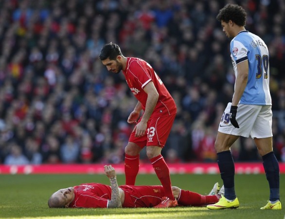 Liverpool's Martin Skrtel stays down after landing heavily on his head while challenging during the Reds' FA Cup quarter-final clash against Blackburn Rovers Martin Skrtel