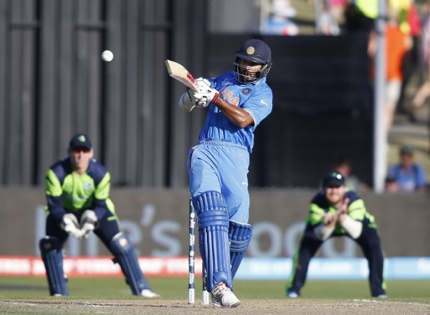 India opener Shikhar Dhawan smashes a ball to the boundary during his hundred against Ireland in their ICC Cricket World Cup 2015 match Shikhar Dhawan India Ireland ICC Cricket World Cup 2015