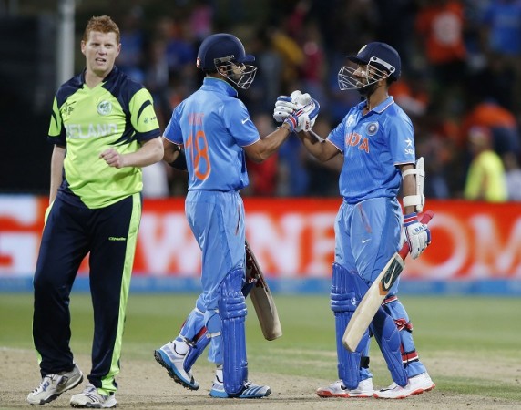 Virat Kohli and Ajinkya Rahane celebrate their victory over Ireland Kevin O'Brien Ireland Virat Kohli Ajinkya Rahane India ICC Cricket World Cup 2015