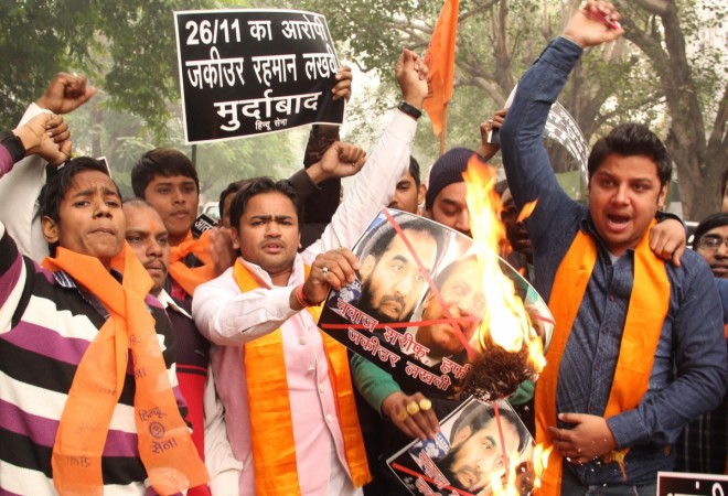 Hindu Sena activists stage a demonstration to protest against the bail of Mumbai attack mastermind Zakiur Rehman Lakhvi in New Delhi, on Dec 19, 2014.