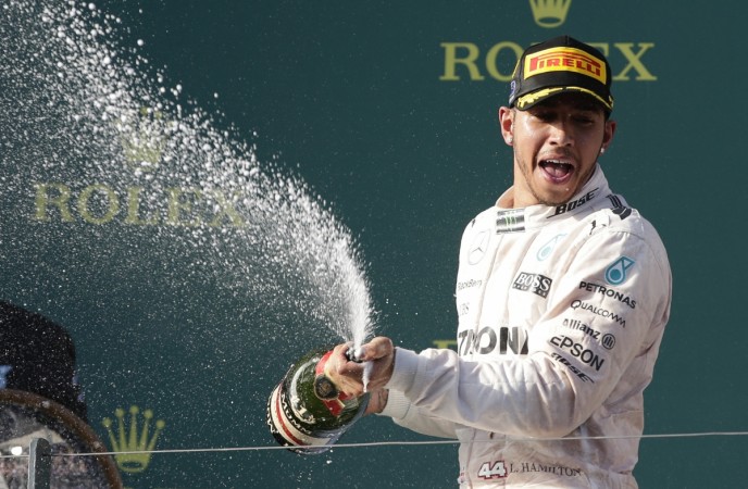 Lewis Hamilton celebrates after winning the Australian Grand Prix Lewis Hamilton