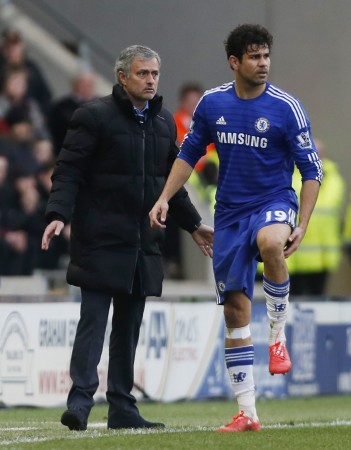 Chelsea manager Jose Mourinho looks on as Diego Costa sustains an injury during the Blues' Premier League clash at Hull City on Sunday Diego Costa