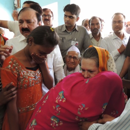 Congress president Sonia Gandhi meeting the farmers and their family members at Rae Bareli in Uttar Pradesh who suffered losses due to unseasonal rain on March 28, 2015. crop damage farmer