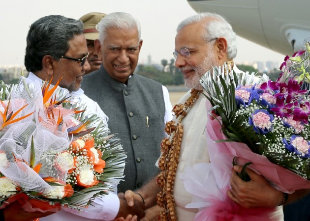 Prime Minister of India Narendra Modi and Karnataka Chief Minister Siddaramaiah (right to left) BJP