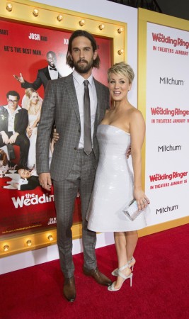 Cast member Kaley Cuoco-Sweeting and her husband Ryan Sweeting pose at the premiere of the Kaley Cuoco