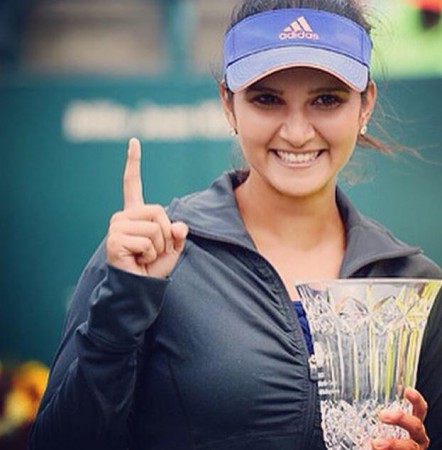 Tennis star Sania Mirza becomes first Indian woman to take the number one spot in the women's doubles rankings Sania Mirza