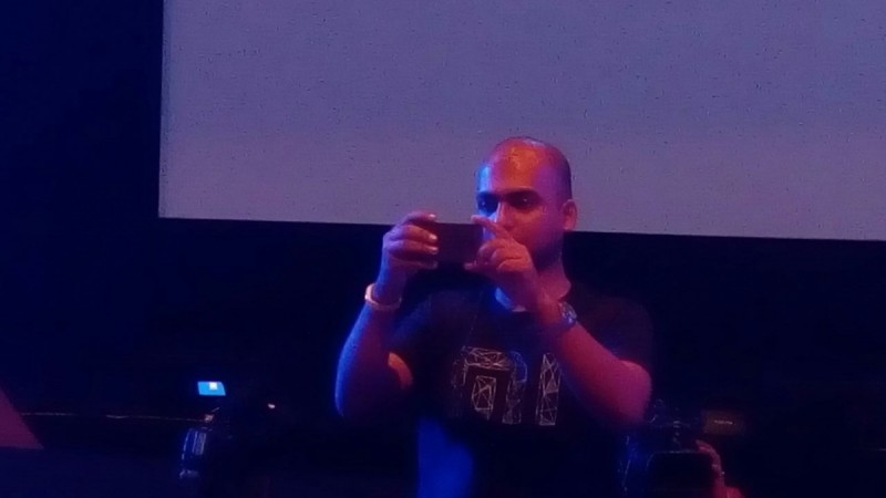 Manu Jain taking photograph of the audience Xiaomi Live