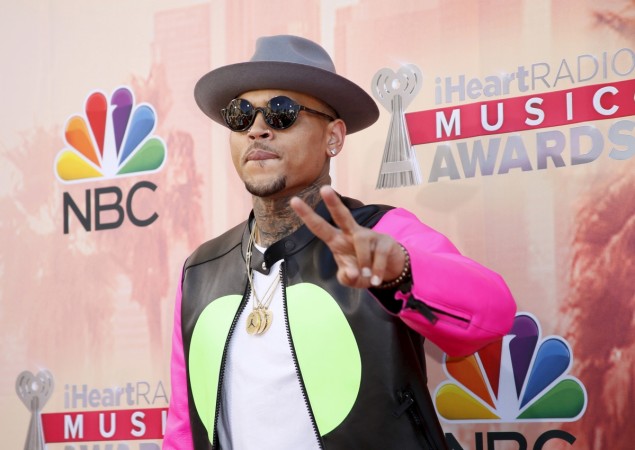 Singer Chris Brown poses at the 2015 iHeartRadio Music Awards in Los Angeles, California, March 29, 2015. Chris Brown