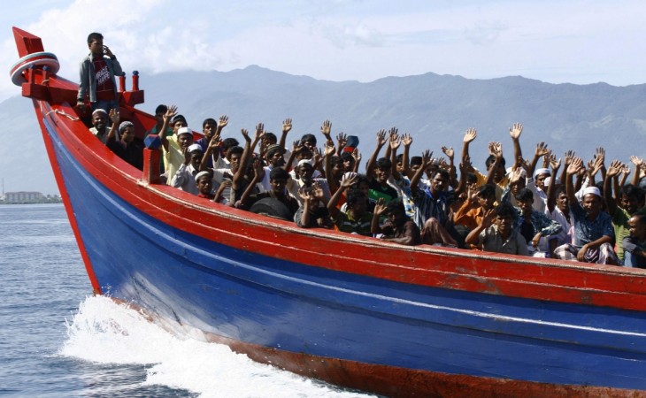 Representational Image: Ethnic Rohingya refugees from Myanmar wave as they are transported by a wooden boat to a temporary shelter in Krueng Raya in Aceh Besar April 8, 2013. Migrants