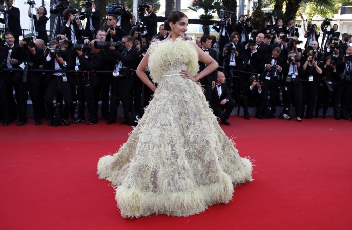 Actress Sonam Kapoor poses on the red carpet as she arrives for the screening of the animated film Sonam Kapoor