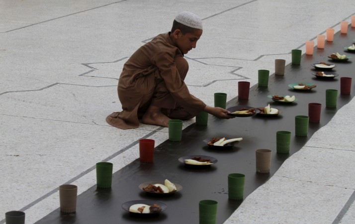 Representational Image: A boy serves plates of fruit in preparation for Iftar on the first day of Ramadan in Peshawar, Pakistan. Ramadan 2018