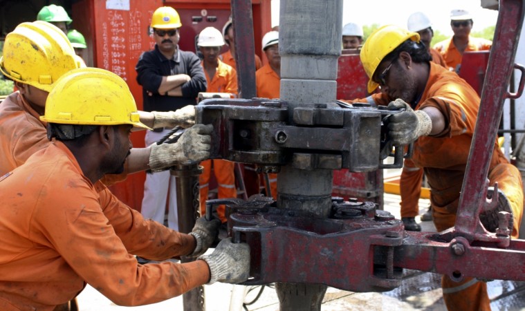 Engineers of Oil and Natural Gas Corp (ONGC) work inside the Kalol oil field in Gujarat in this 2009 file photo. ONGC