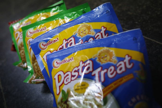 Sunfeast-branded instant past meals, which are part of a line of fast-moving consumer goods owned by Indian cigarette maker ITC, are displayed for sale at a grocery store in Mumbai May 17, 2013. ITC