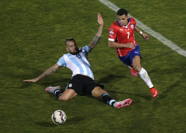 File photo of Nicolas Otamendi (L). Nicolas Otamendi Argentina Alexis Sanchez Chile