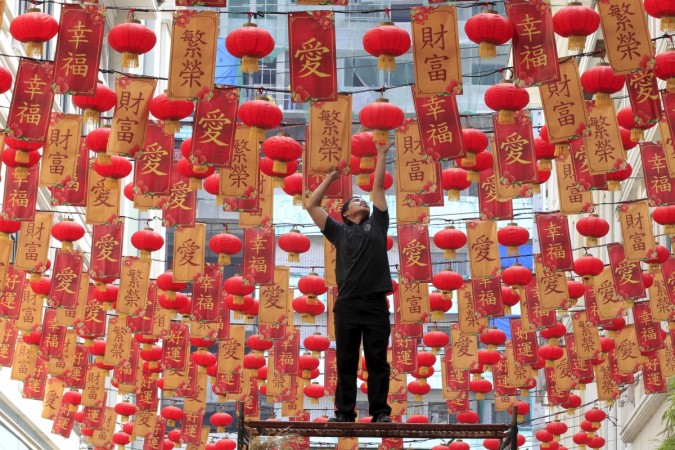 Chinese lanterns are being arranged as part of the decorations for Chinese New Year 2016 celebrations.