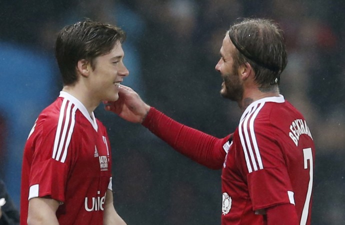Brooklyn and David Beckham during the Great Britain & Ireland XI v World XI - Unicef Charity Match.