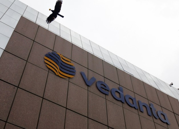 A bird flies by the Vedanta office building in Mumbai August 16, 2010. Vedanta group Cairn India