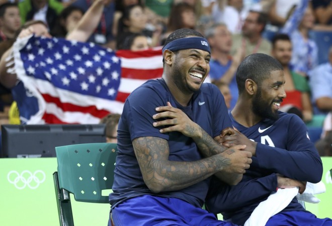 Carmelo Anthony of the USA and team mate Kyrie Irving celebrate.
