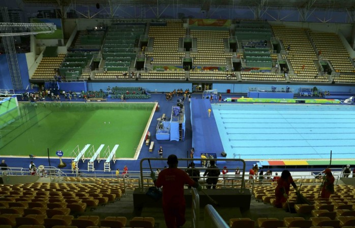 Urine, algae or 'Shrek' effect? Athletes puzzled as Olympic pool turns ...