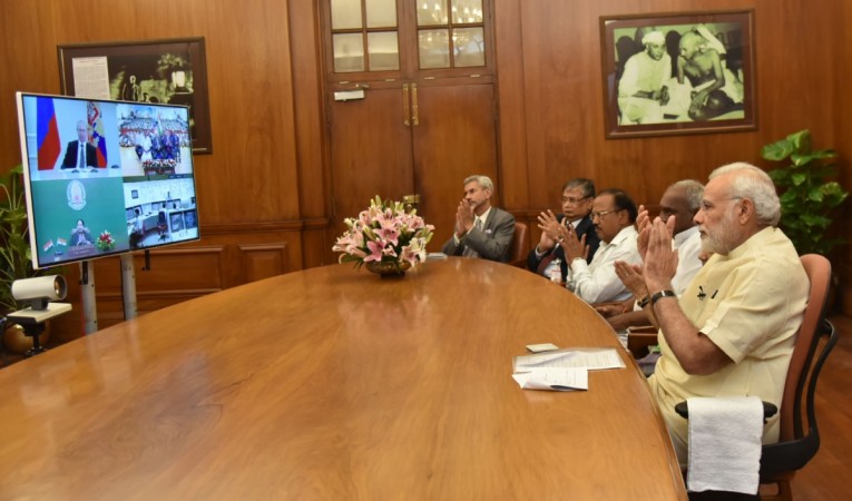 Prime Minister Narendra Modi attends the dedication Kudankulam Nuclear Power Plant Unit-1 to the nation with Russian President Vladimir Putin and Tamil Nadu Chief Minister J Jayalalitha, through video conferencing, in New Delhi on Aug. 10, 2016.