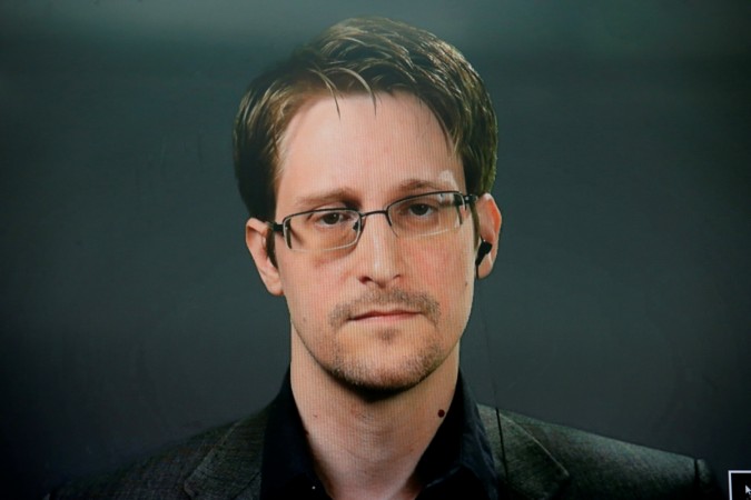Edward Snowden Edward Snowden speaks via video link during a news conference