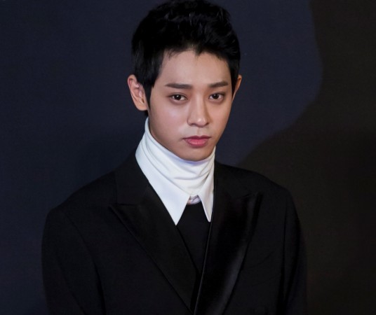 South Korean singer Jung Joon-young poses on the red carpet as he attends the 2014 Mnet Asian Music Awards (MAMA) in Hong Kong December 3,2014 Jung Joon Young