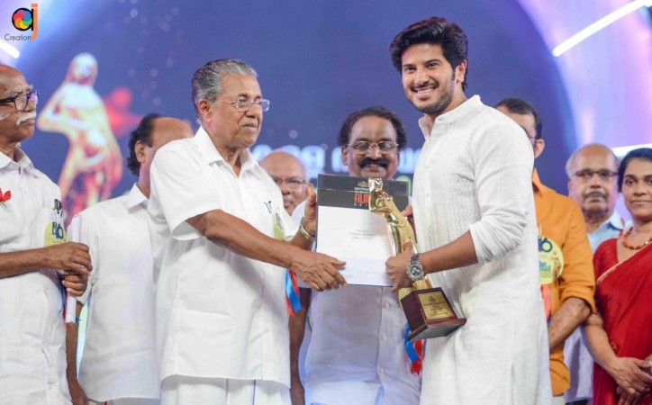 Dulquer Salmaan receives Kerala State Film Best Actor Award from Chief Minister Pinarayi Vijayan. Dulquer Salmaan receives Kerala State Film Best Actor Award from Pinarayi Vijayan