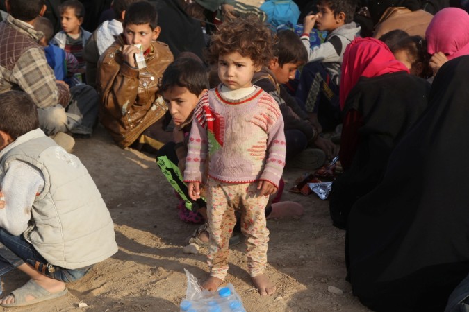 A view of displaced people who are fleeing from clashes in al-Shura. Mosul