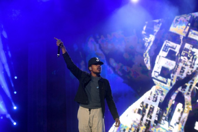 Chance The Rapper led hundreds to early voting on Monday night in Chicago. chance the rapper
