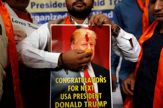 Pakistan fears Trump as President could be more pro-India than traditional Republican Presidents. In Picture: A member of Hindu Sena, a right-wing Hindu group, holds a poster of US Republican presidential nominee Donald Trump as they symbolically celebrate his victory in the upcoming US elections, in New Delhi, India, 4 November 2016. Trump is considered a pro-India President