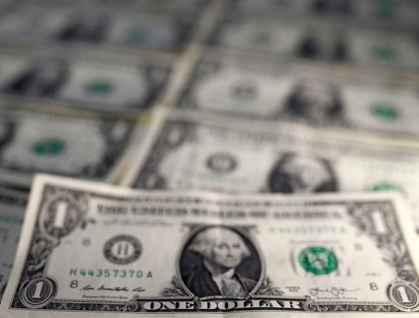 U.S. dollar notes are seen in this November 7, 2016 picture illustration. us dollar rupee investments fii india exchange rate inflation us fii fpi stock markets sensex donald trump modi india currency ban